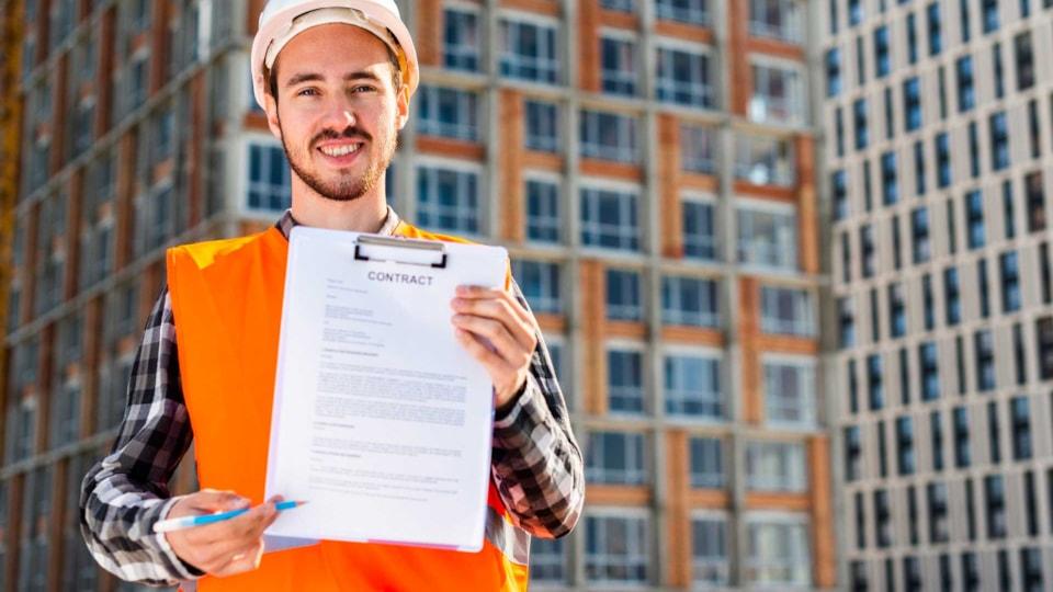 construction-engineer-holding-contract